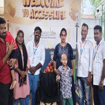 Provided wheel chair to the cancer affected child